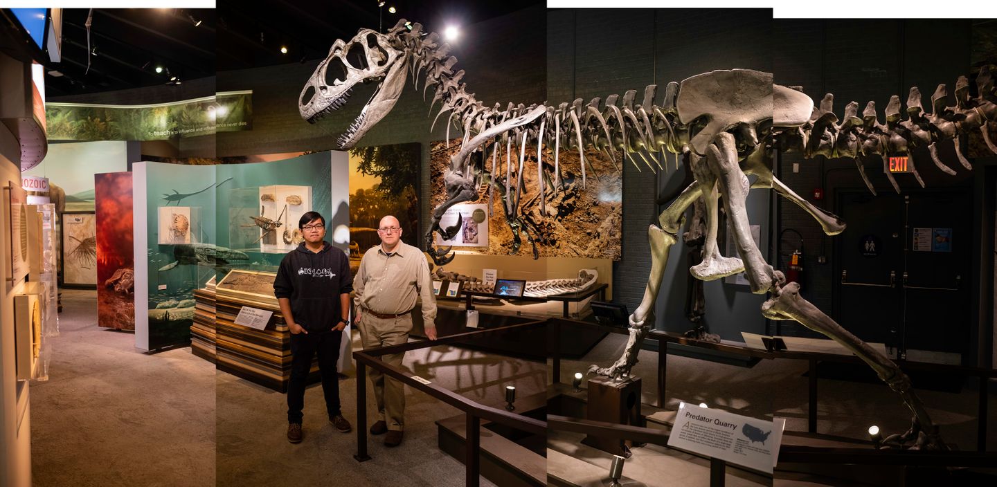Paleontologists Gabe Santos and Andy Farke stand for a portrait next to a Tyrannosaurus Rex skeleton at the Raymond Alf Museum of Paleontology on the campus of the The Webb Schools in Claremont, CA.