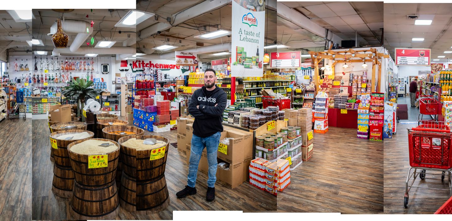 Mohamad Tabaja, the son of Lebanese immigrants, stands for a portrait inside Basha Market, the ethnic grocery store in Charter Oak that his father opened nearly 18 years ago, and that he now manages.