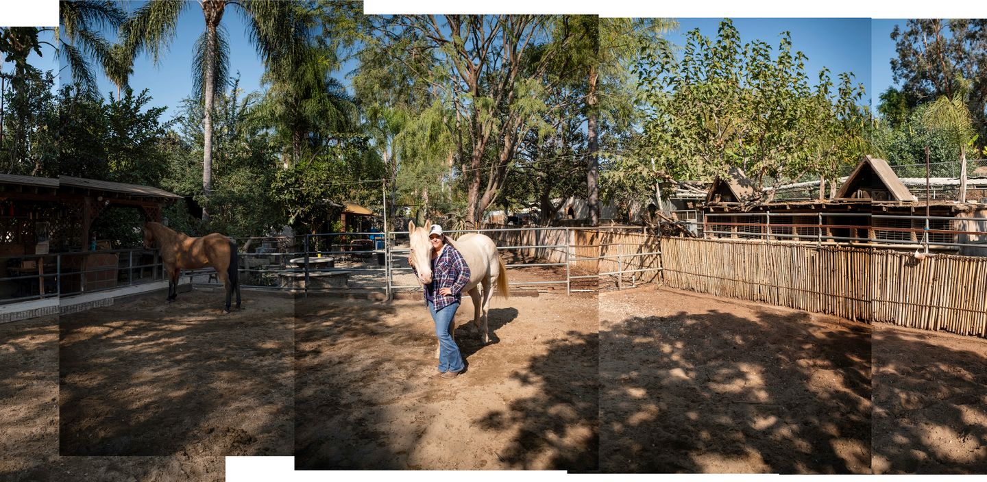 Health educator and horse enthusiast, Alejandra Aviña, stands in the middle of the corral at Hacienda Esperanza with her horse, Güero.