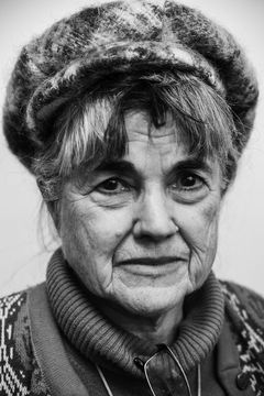 A duotoned black-and-white portrait of Francine Rippy.