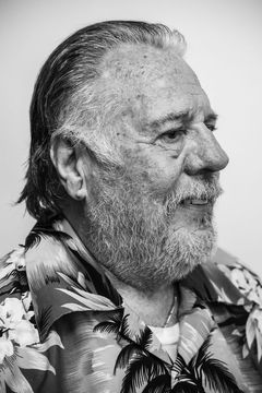 A duotoned black-and-white portrait of Gary Enderle.