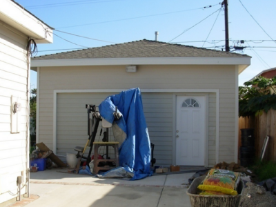 Photo 2: The garage is inaccessible for the parking of vehicles as the garage door entrance is sealed.